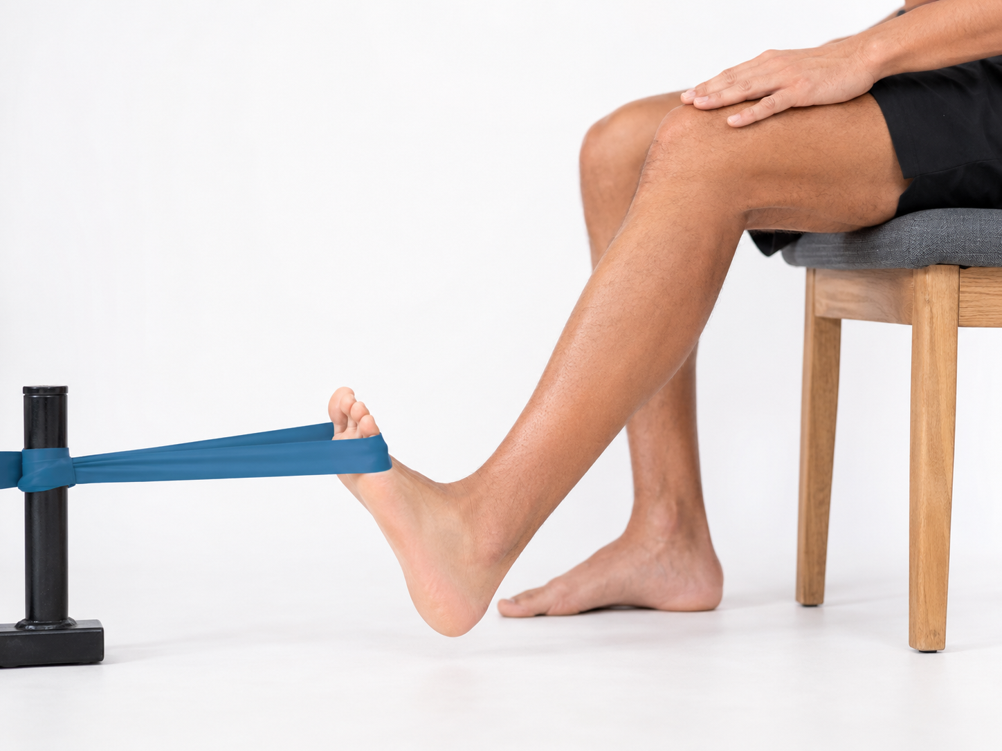 Renforcement tibial antérieur avec élastique en position assise — rééducation périostite tibiale